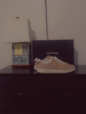 CHANEL women’s Dark Beige Suede Low-Top Sneakers